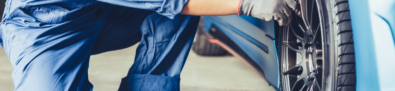 mechanic inspecting engine bay